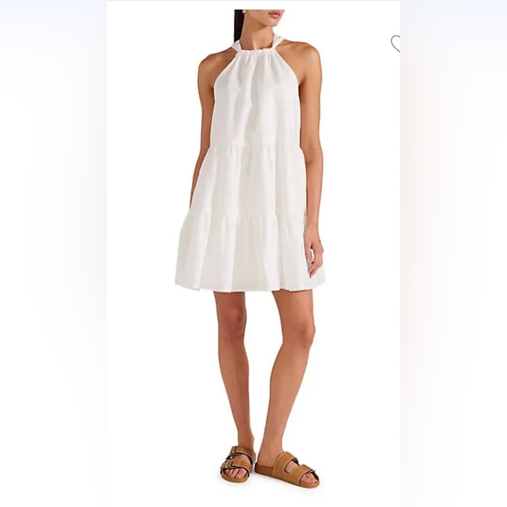 Gorgeous mini ruffled summer dress. White. Size M